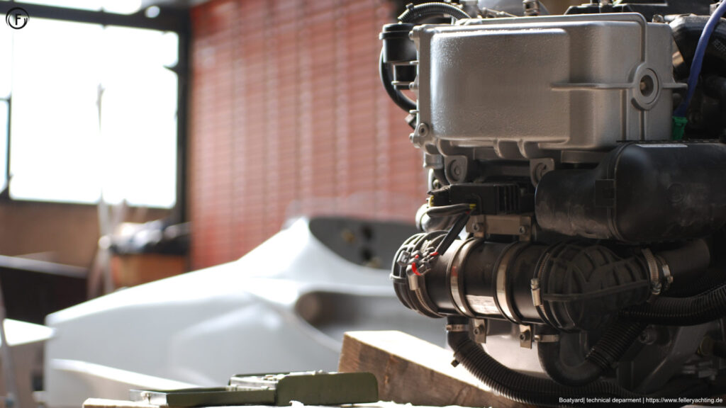 Technical department at FELLERyachting. On the picture is a petrol engine, converted to run on 100% regenerative Methanol (M100). Uwe Feller is an engine specialist with practical experience and knowledge in the use of alternative fuels.