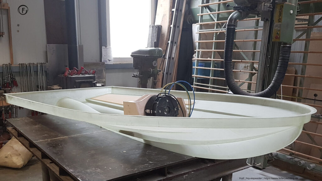Infused hull of the "Aquaspeeder" the electric motor in position. View on the propeller tunnel.